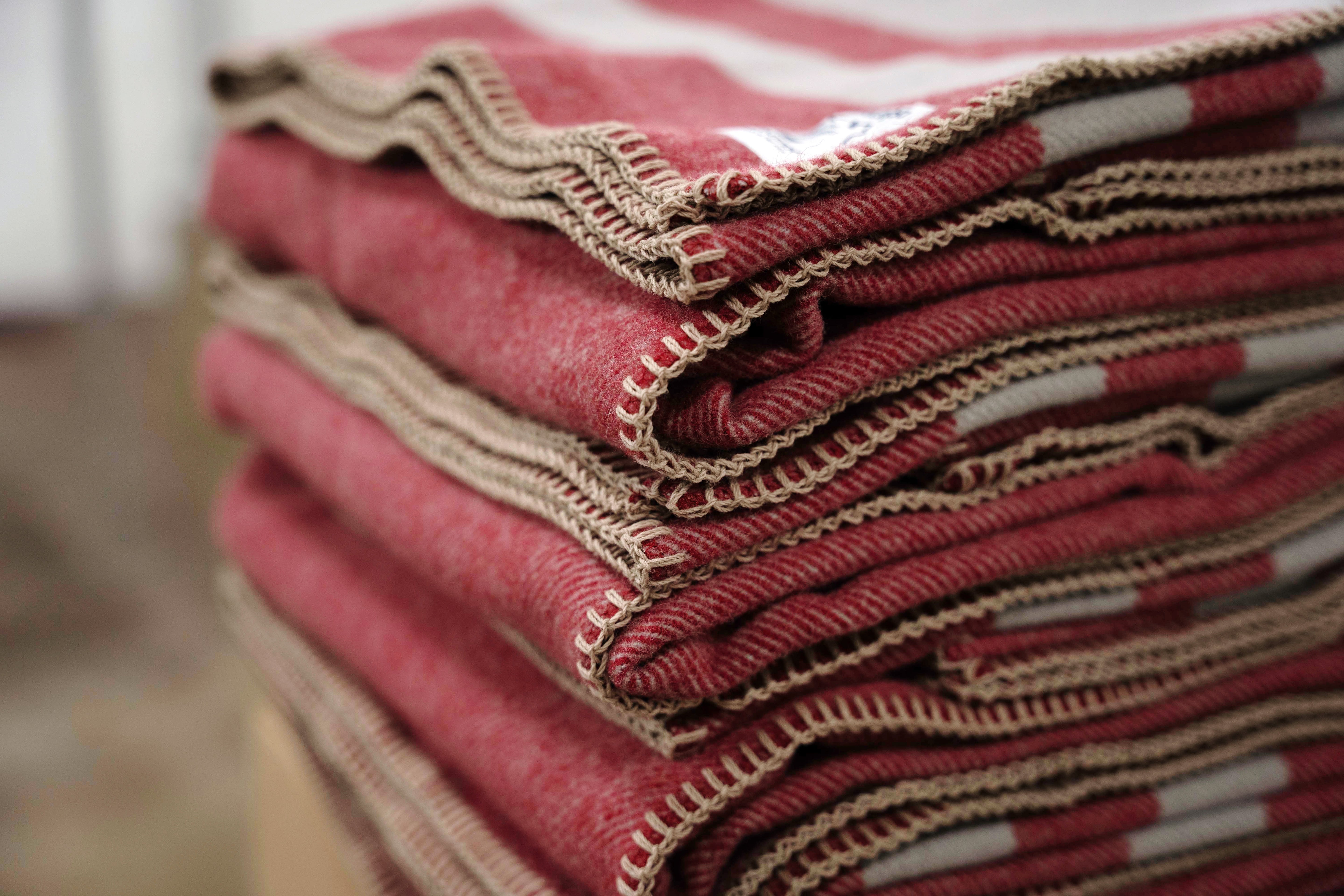 Stack of folded Northwest Wool Throws.