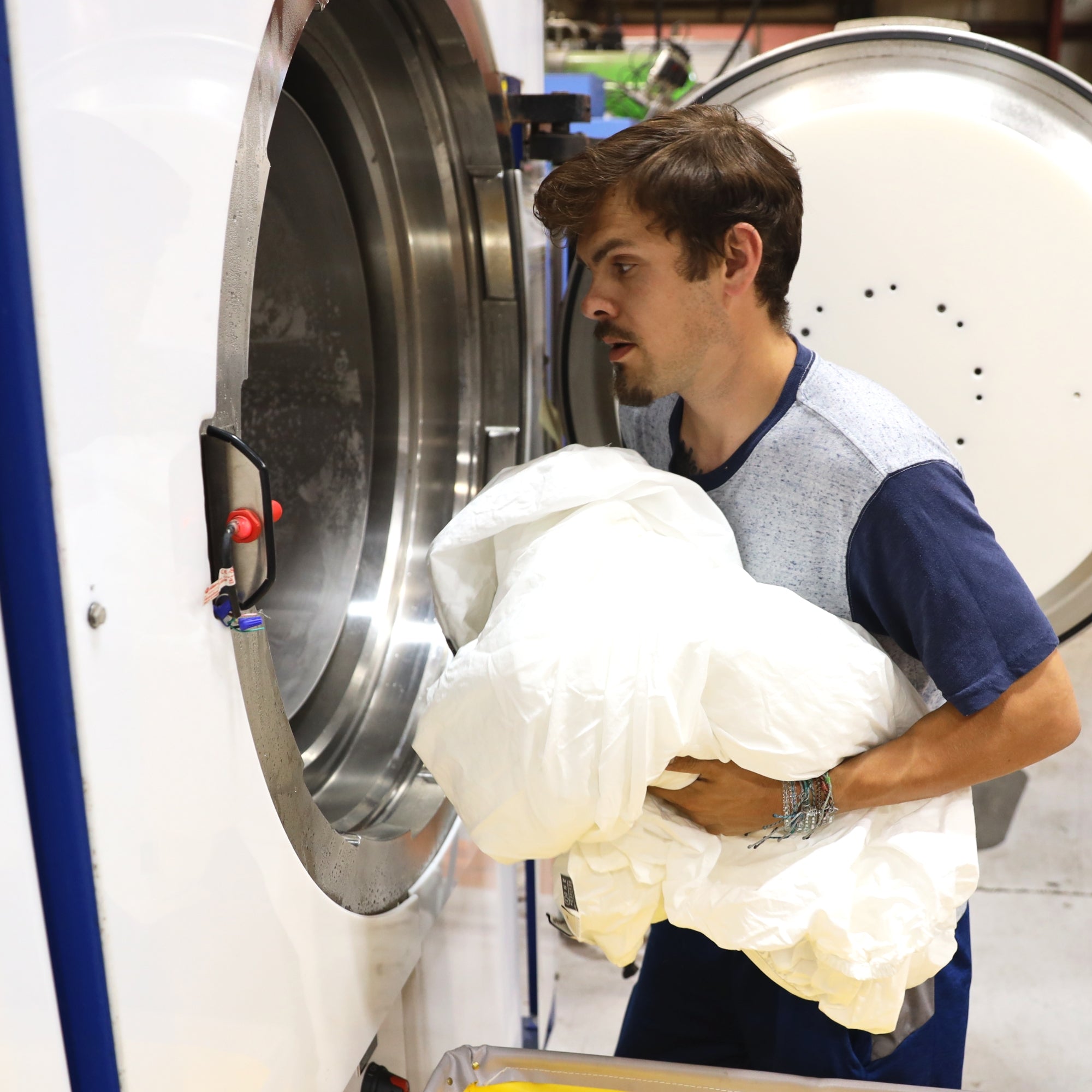 putting bedding in washing machine