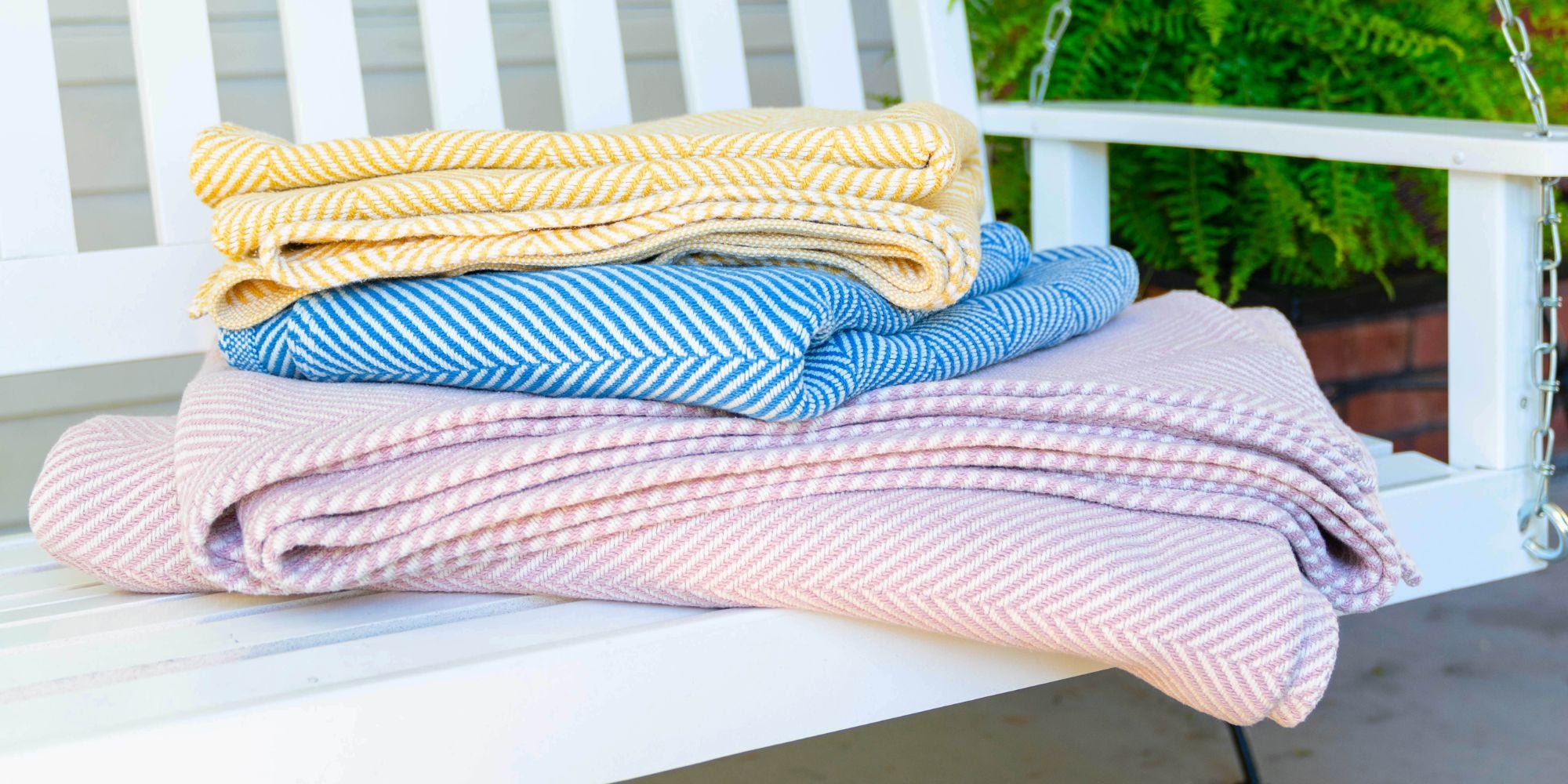 blankets stacked on front porch