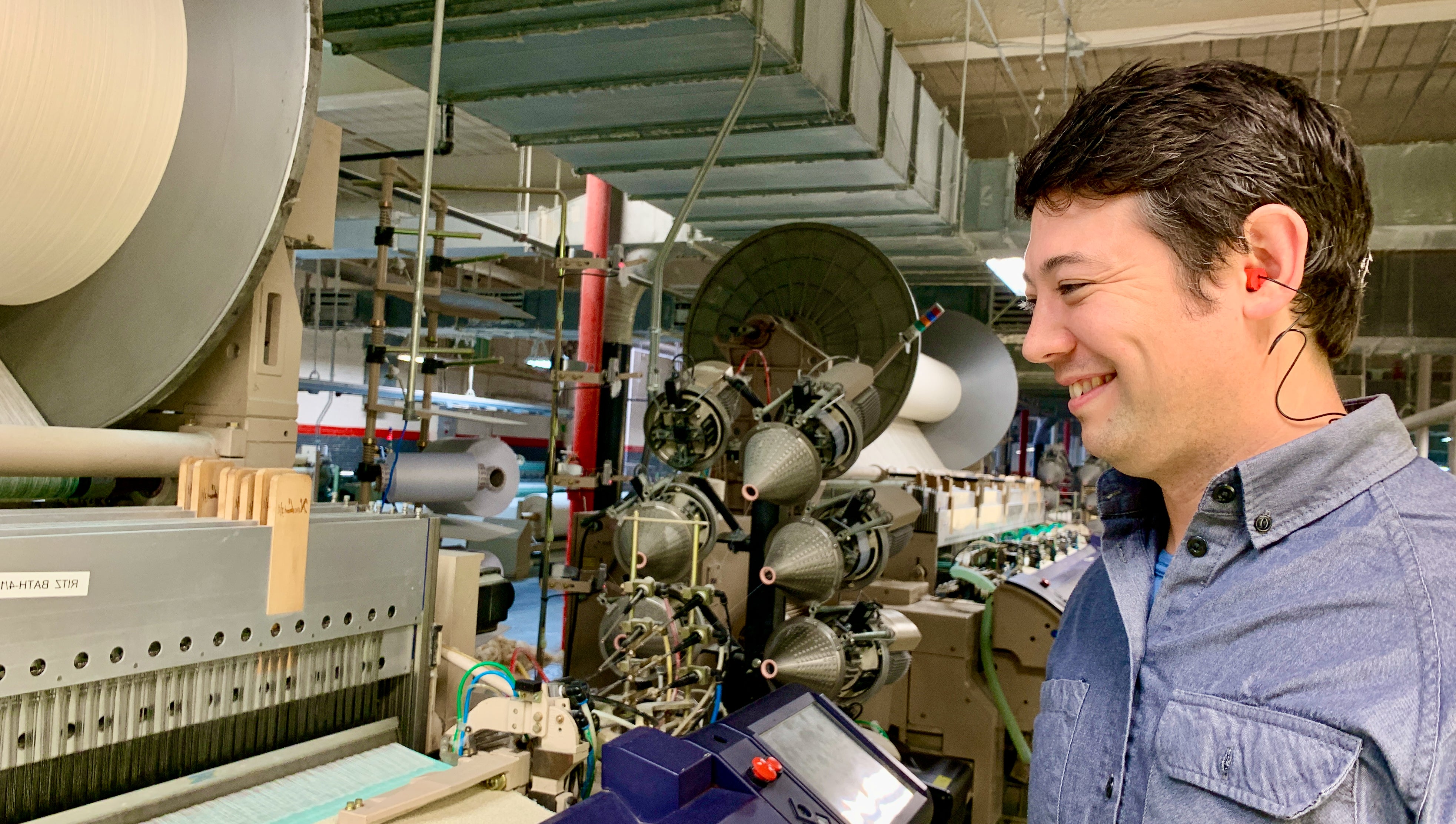 jimmy looking at a clean manufacturing facility