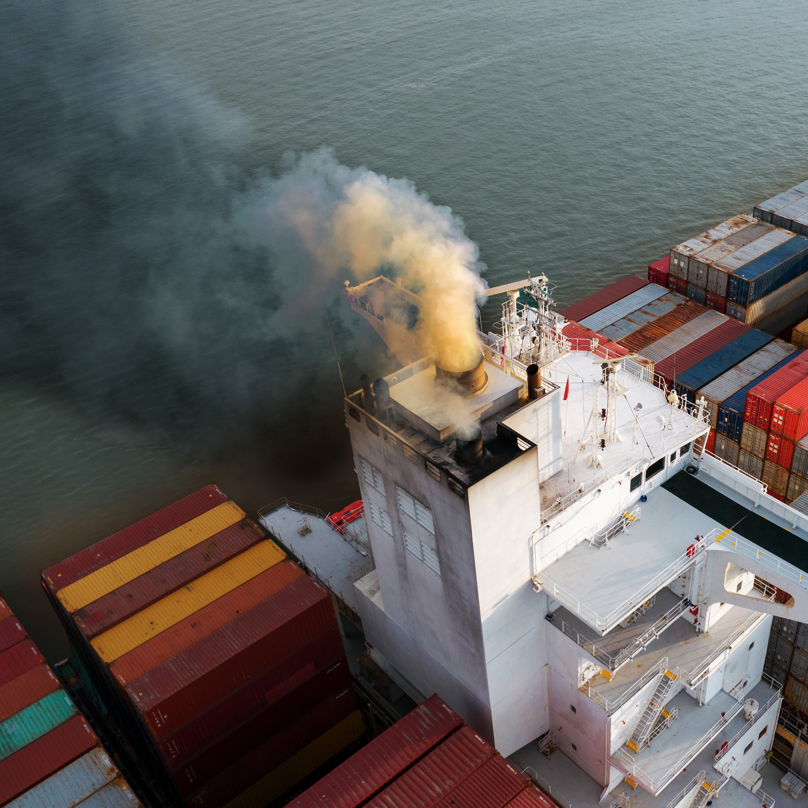 Smoggy international container ship polluting waters