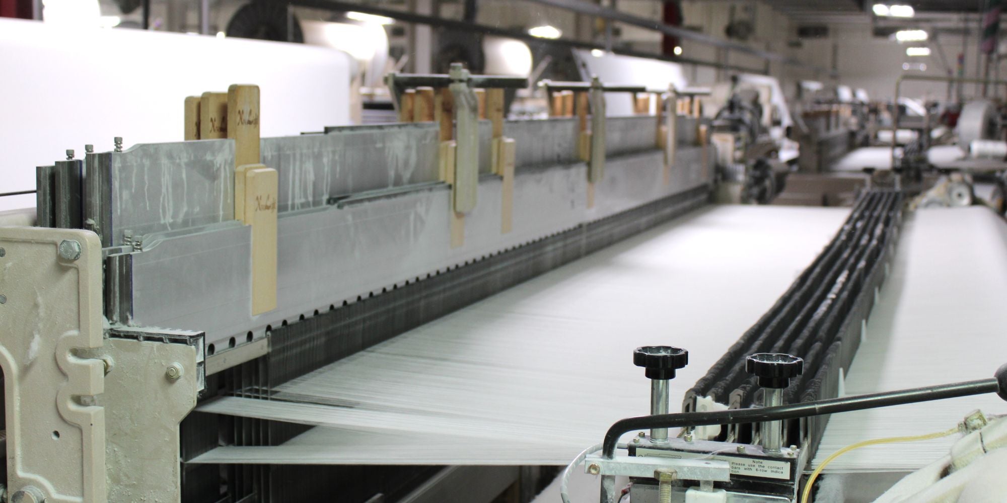 weaving american made sheets on a loom in USA