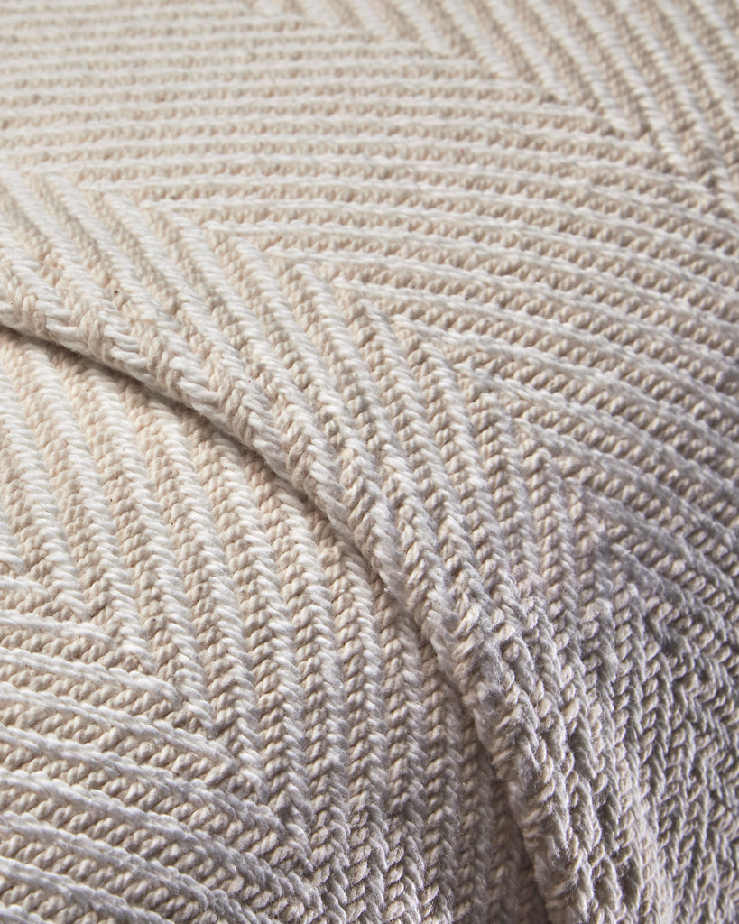 american made blanket in natural with a herringbone pattern.