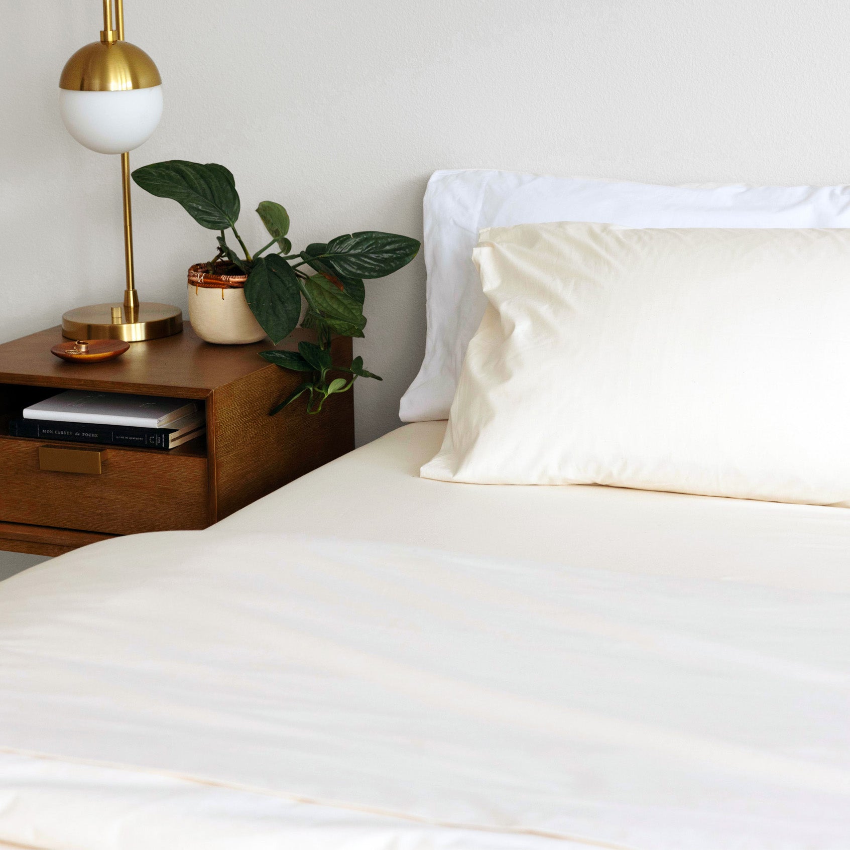 Bed made with Rustic Cotton and Cloud White Heritage American Sheets.